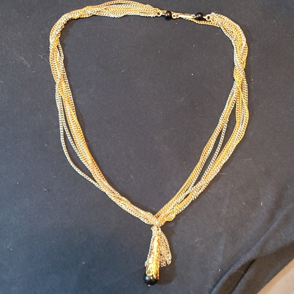 Signed celebrity gold and silver toned necklace